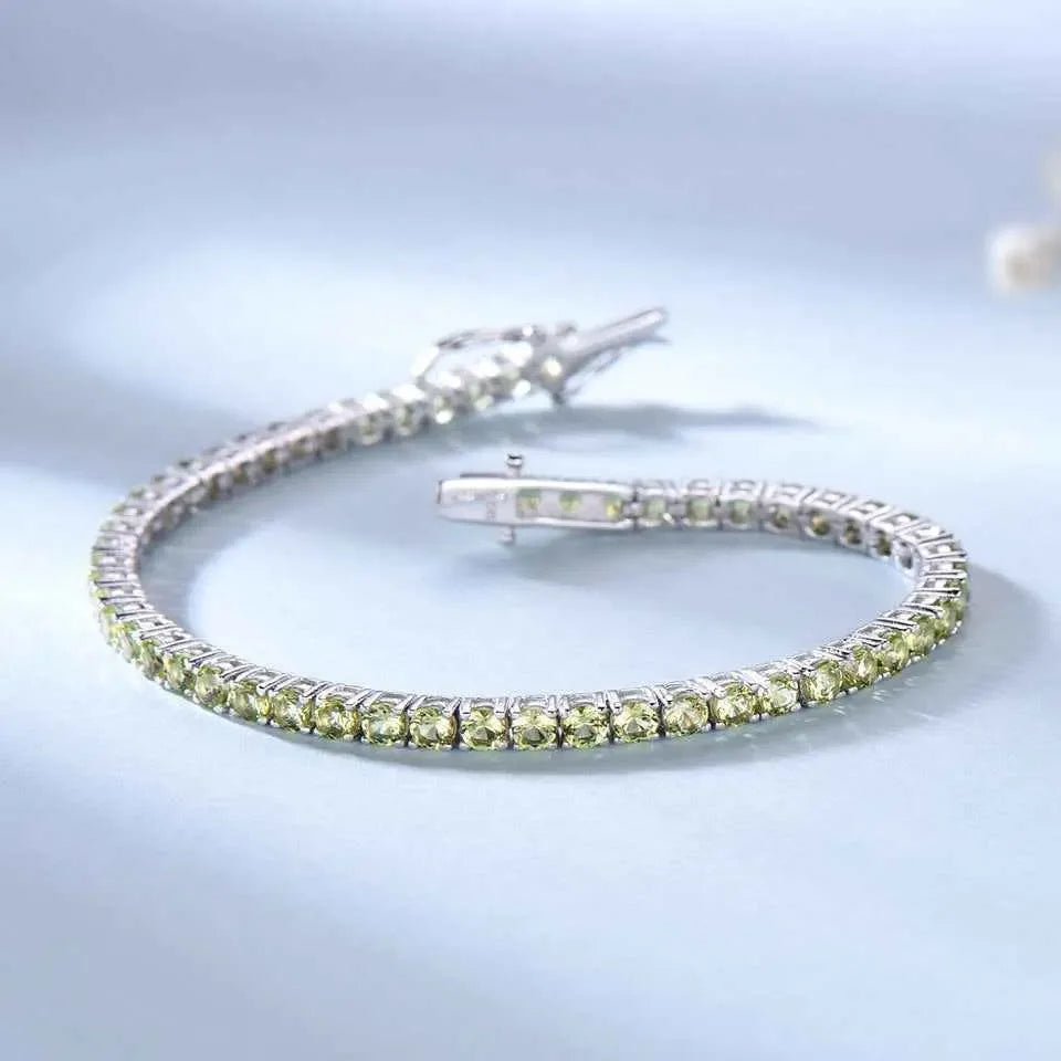 Sterling Silver Full Of CRYSTALS Luxury Peridot Bracelet , A Sterling Silver Luxury Peridot Bracelet, adorned with dazzling diamonds, radiating opulence and sophistication with its exquisite blend of shimmering gemstones. - CRYSTALOIL