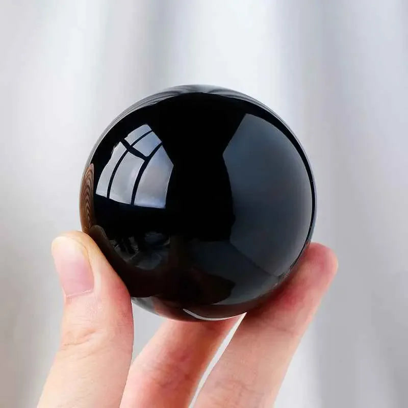 Natural Obsidian Crystal Ball , Discover the mystique of the cosmos with a natural obsidian crystal ball, - CRYSTALOIL