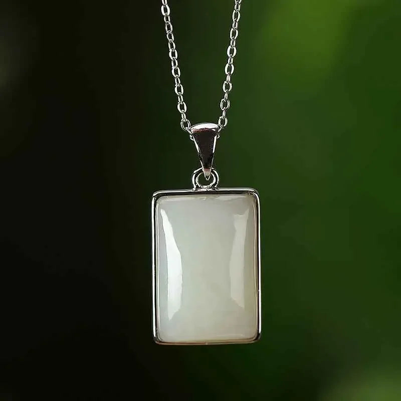 Sterling Silver Gold-plated Hetian Jade Sapphire Pendant, this pendant exudes luxury and sophistication - CRYSTALOIL