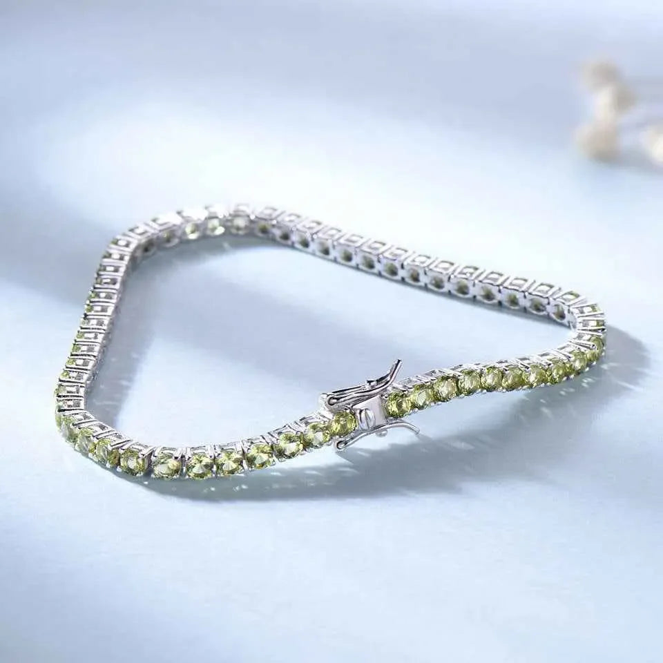 Sterling Silver Full Of CRYSTALS Luxury Peridot Bracelet , A Sterling Silver Luxury Peridot Bracelet, adorned with dazzling diamonds, radiating opulence and sophistication with its exquisite blend of shimmering gemstones. - CRYSTALOIL