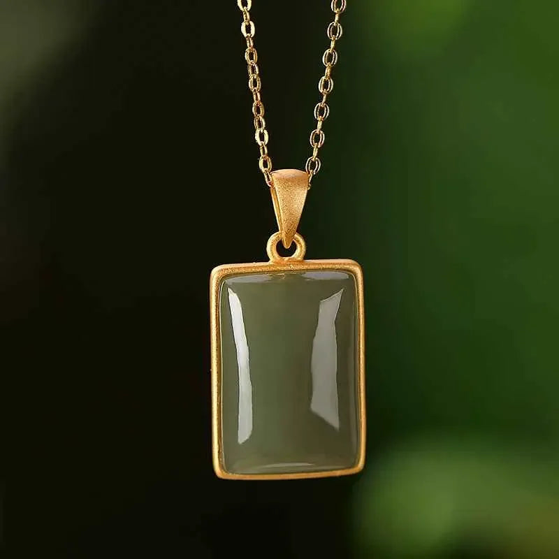 Sterling Silver Gold-plated Hetian Jade Sapphire Pendant, this pendant exudes luxury and sophistication - CRYSTALOIL