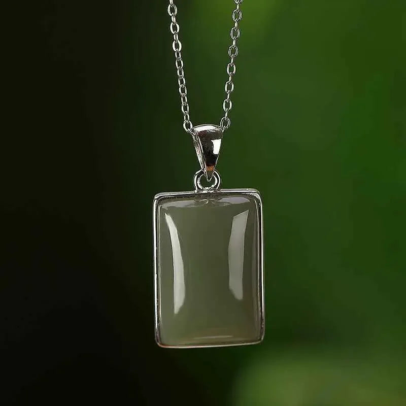 Sterling Silver Gold-plated Hetian Jade Sapphire Pendant, this pendant exudes luxury and sophistication - CRYSTALOIL