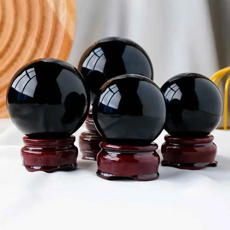 Natural Obsidian Crystal Ball , Discover the mystique of the cosmos with a natural obsidian crystal ball, - CRYSTALOIL