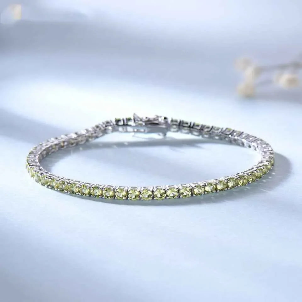 Sterling Silver Full Of CRYSTALS Luxury Peridot Bracelet , A Sterling Silver Luxury Peridot Bracelet, adorned with dazzling diamonds, radiating opulence and sophistication with its exquisite blend of shimmering gemstones. - CRYSTALOIL